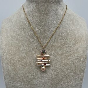 Gold and Pearl Star Pendant Necklace